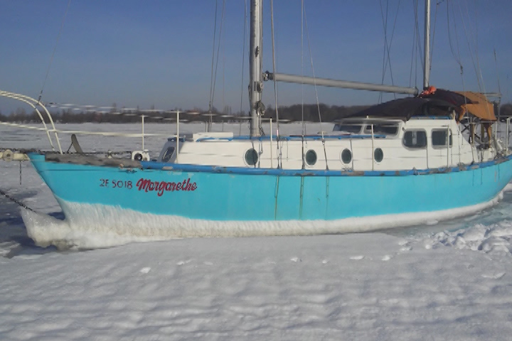 This sailboat is locked in Lake Ontario ice as part of a winter experiment.