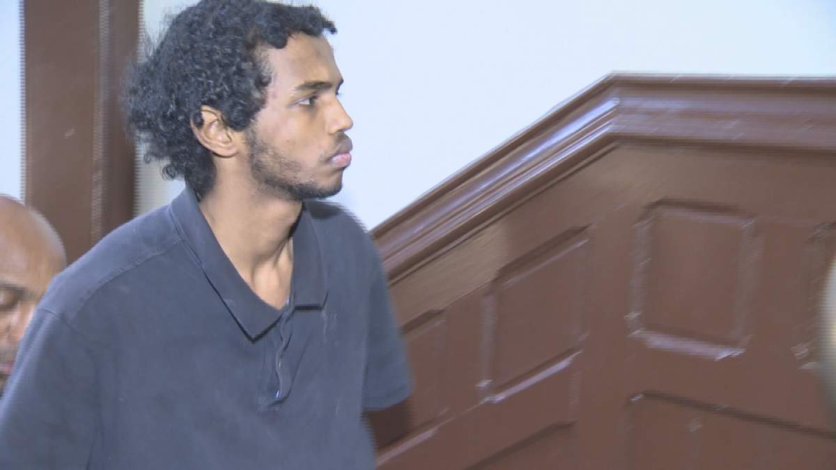 FILE- Abdoul Abdi appears in this file photo attending a Halifax Provincial Court hearing.