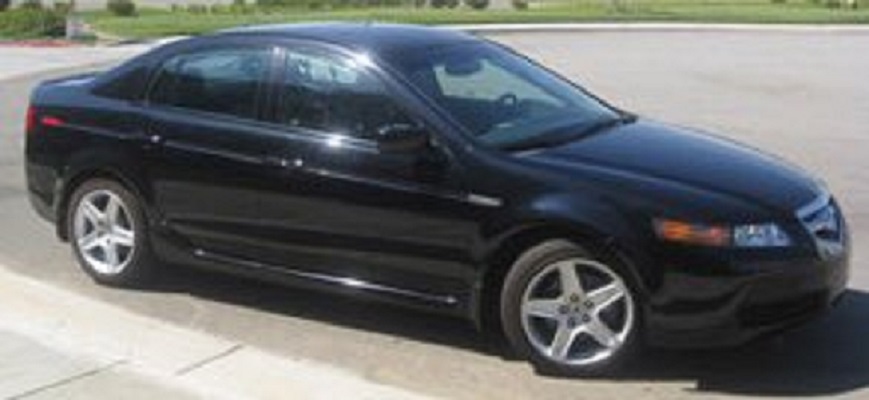 A stock image of a black four-door Acura sedan.