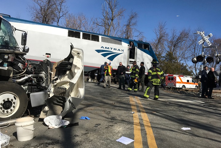 Emergency first responders work at the scene of the crash where an Amtrak passenger train carrying Republican members of the U.S. Congress from Washington to a retreat in West Virginia collided with a garbage truck in Crozet, Virginia, U.S. January 31, 2018. 