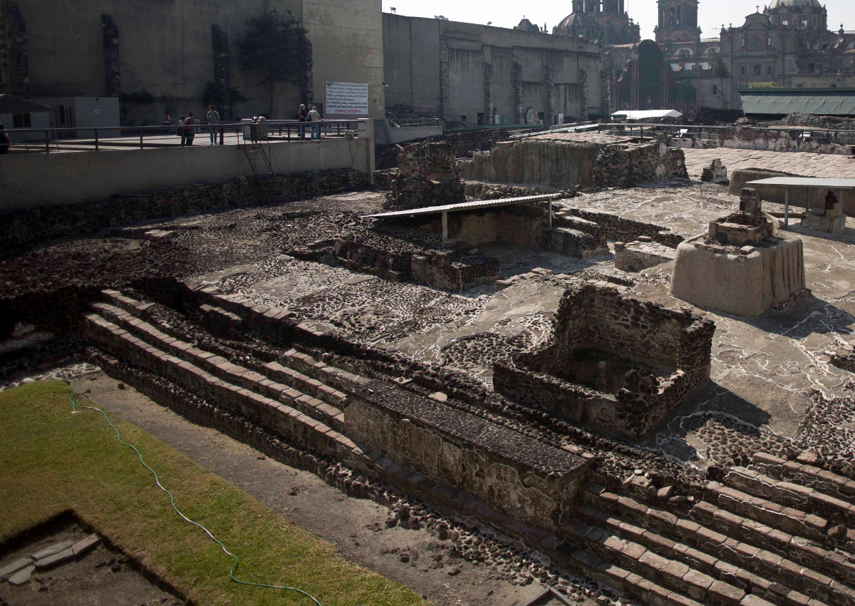 Tourists visit the Templo Mayor archaeological site in Mexico City, Tuesday Dec. 1, 2015. 