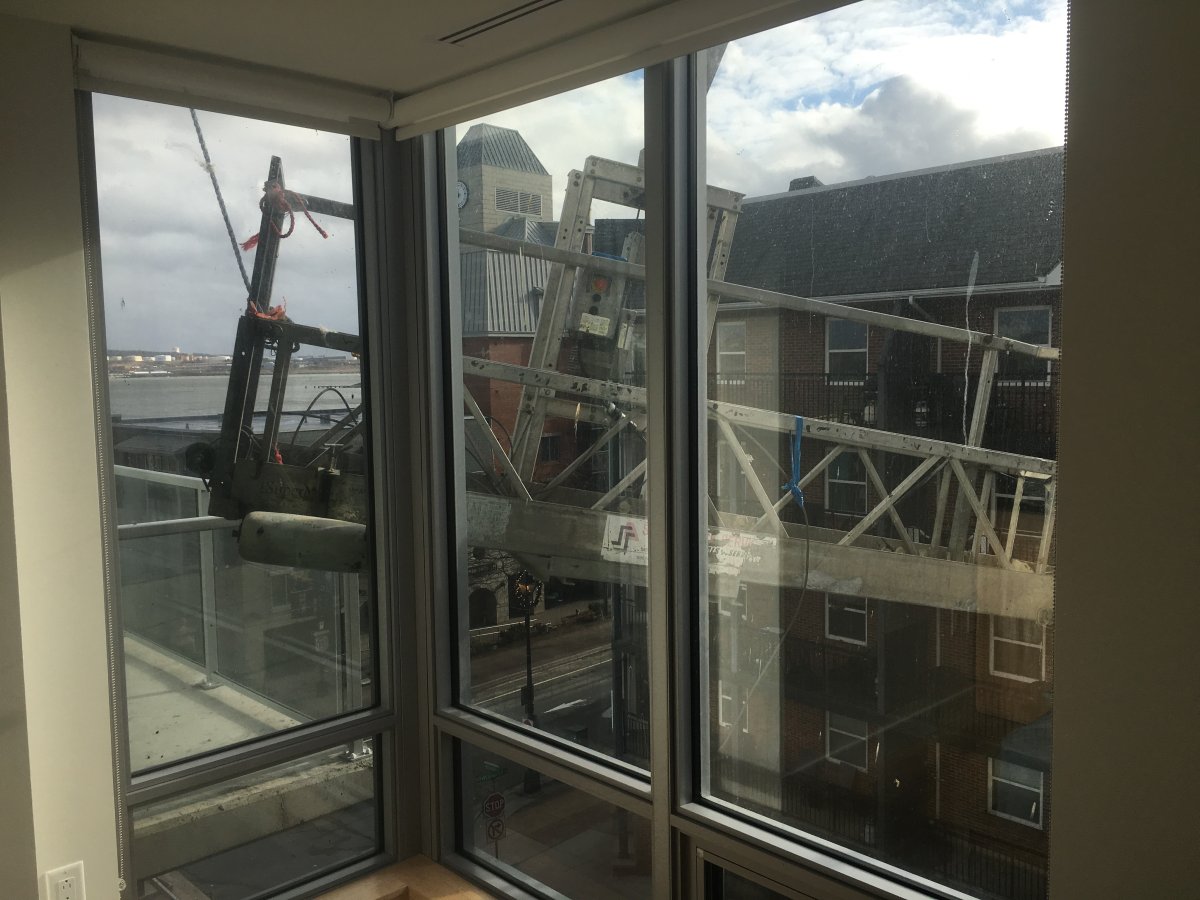 A couple was awoken in the middle of the night in downtown Halifax when scaffolding came loose during an intense storm and started crashing into their bedroom window.