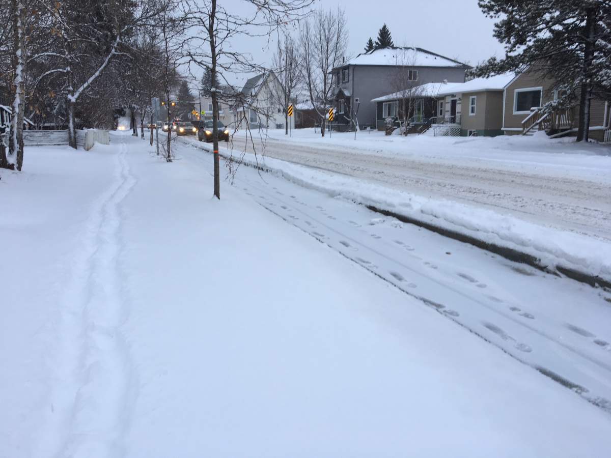 Bike lanes on 76 Avenue near 106 Street were cleared after a big snowfall in Edmonton. January 26, 2018.