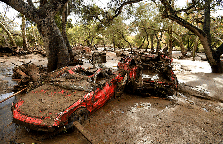 Mangled cars are stuck in Montecito, Calif., after a major storm caused mudslides on Jan. 9, 2018.