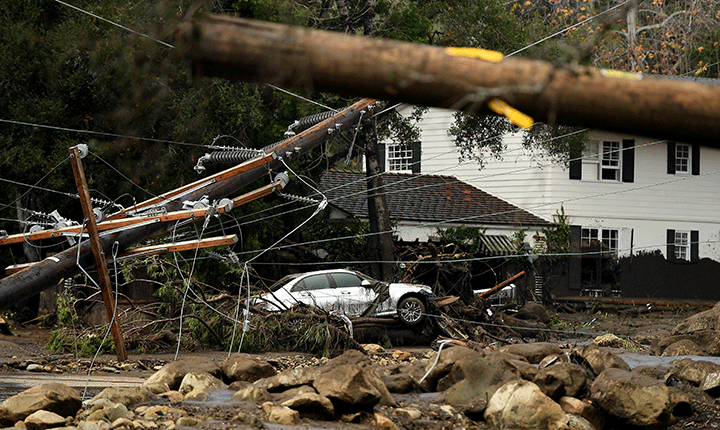 A car sits along a road in Montecito, Calif., after a major storm caused mudslides on Jan. 9, 2018.