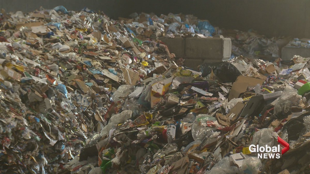 Piles of Christmas waste is seen at a Calgary recycling facility. 