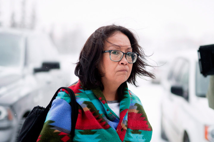 Debbie Baptiste, the mother of Colten Bouchie, walks to the Court of Queen’s Bench on January 30, 2018 during the first day of the trial of Gerald Stanley, (not pictured), the farmer accused of killing the 22-year-old man.