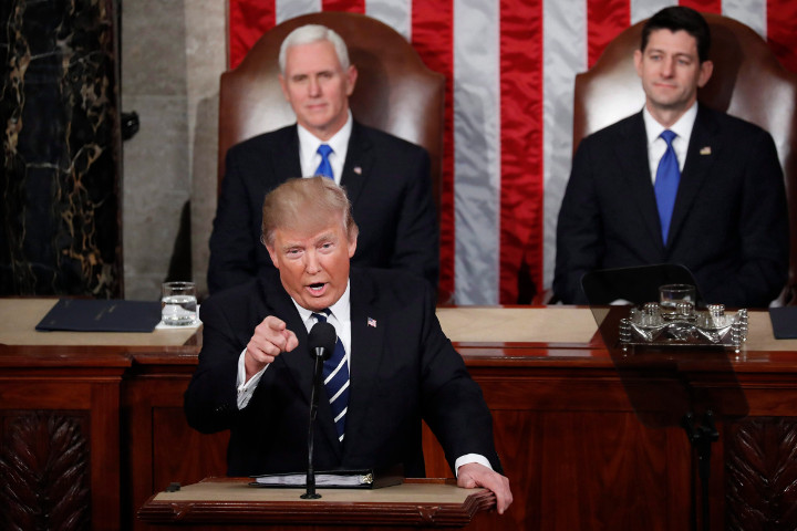 U.S. President Donald Trump addresses a joint session of Congress on Capitol Hill in Washington, Tuesday, Feb. 28, 2017. Vice President Mike Pence and House Speaker Paul Ryan of Wis. listen. 