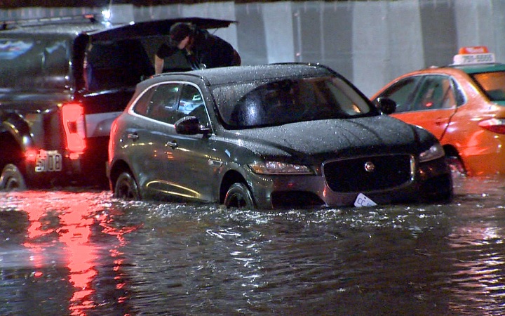 Multiple vehicles were trapped following flooding on Bayview Avenue in Toronto on Jan. 12, 2018.