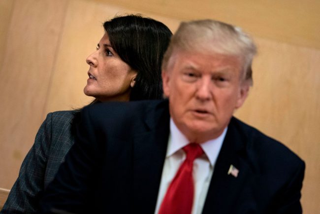 US Ambassador to the UN Nikki Haley and US President Donald Trump wait for a a meeting on United Nations Reform at UN headquarters in New York on September 18, 2017.