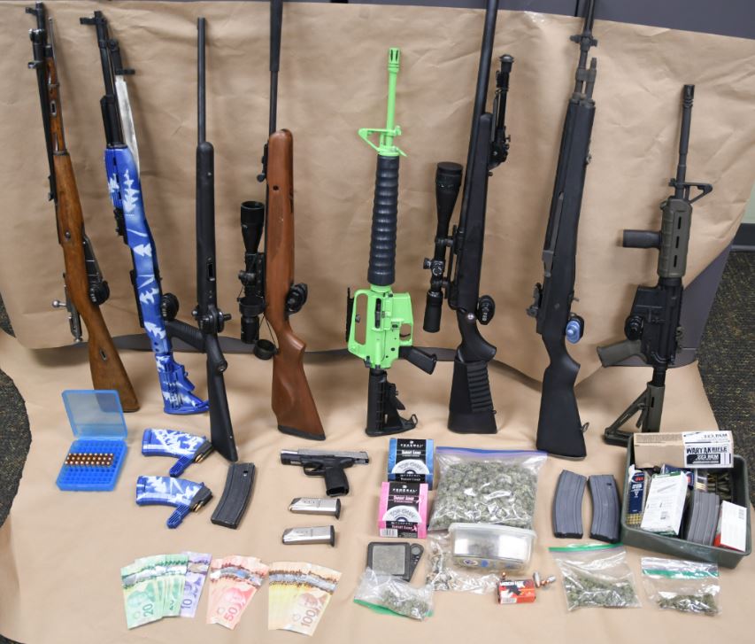 London police provided an image of the guns and drugs seized. 