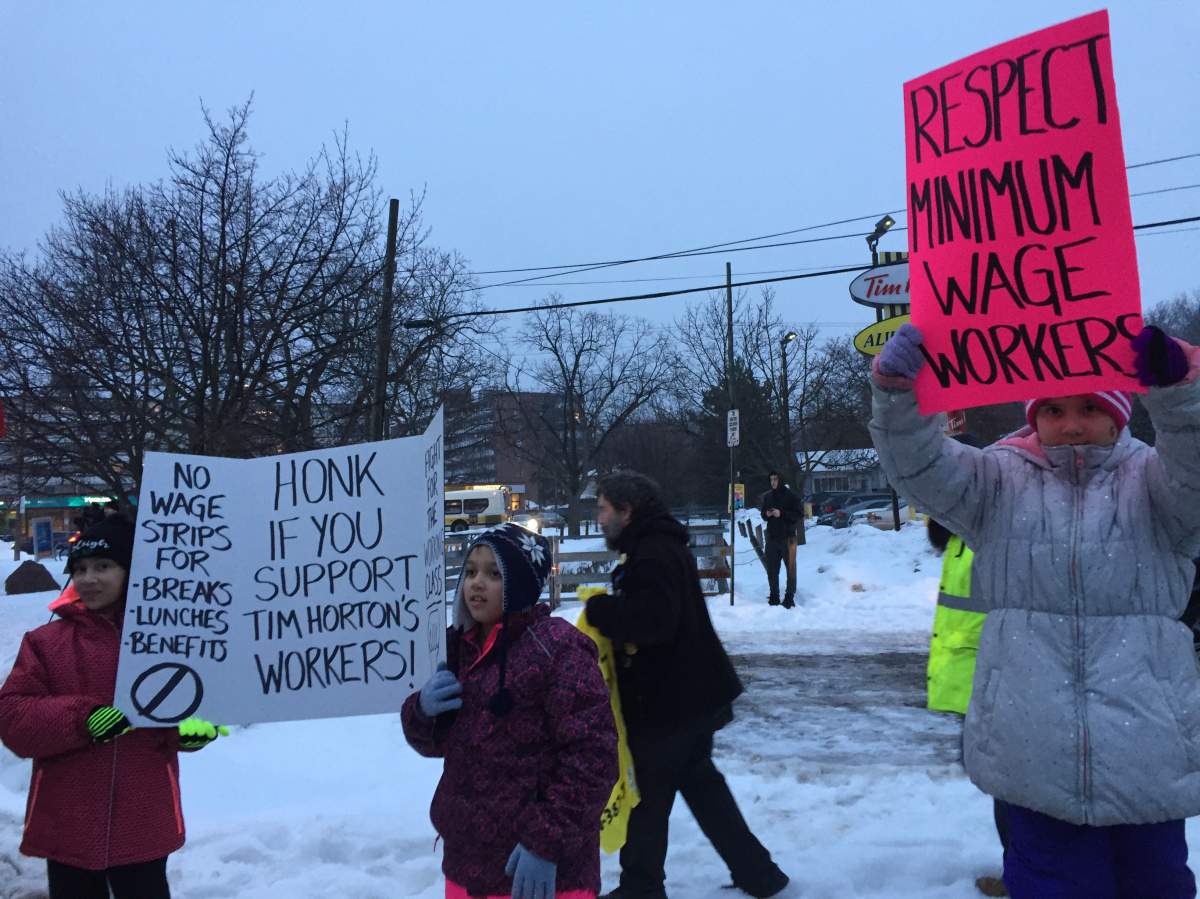 Protest held at Tim Hortons in Dundas after reports of cuts to employee benefits - image