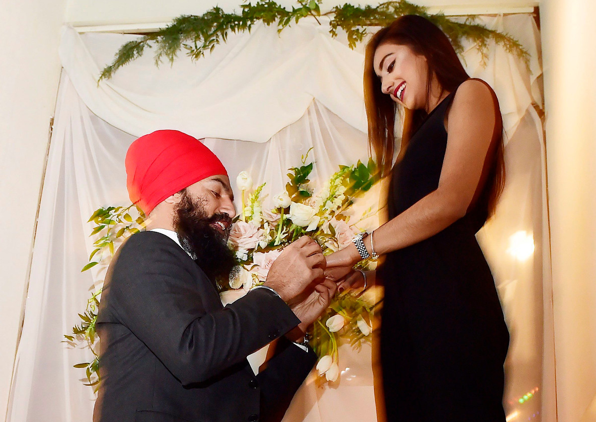 NDP Leader Jagmeet Singh proposes to Gurkiran Kaur at an engagement party in Toronto, Tuesday January 16, 2018. 
