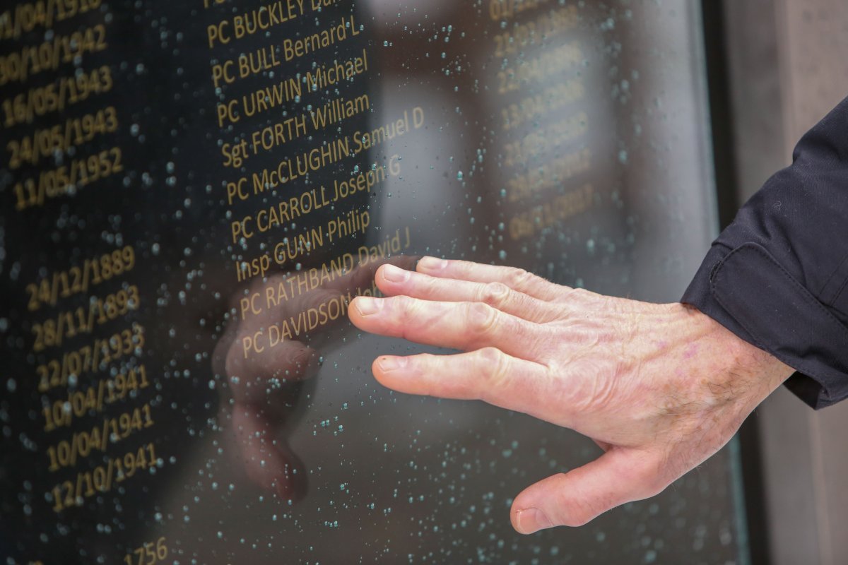 A British police department has added Const. John Davidson's name to their memorial wall to honour the fallen officer. 