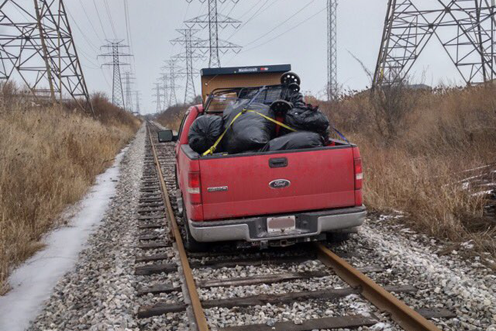 A stolen pick-up truck drove onto a rail line and got stuck while fleeing from police, according to OPP Sgt Kerry Schmidt.