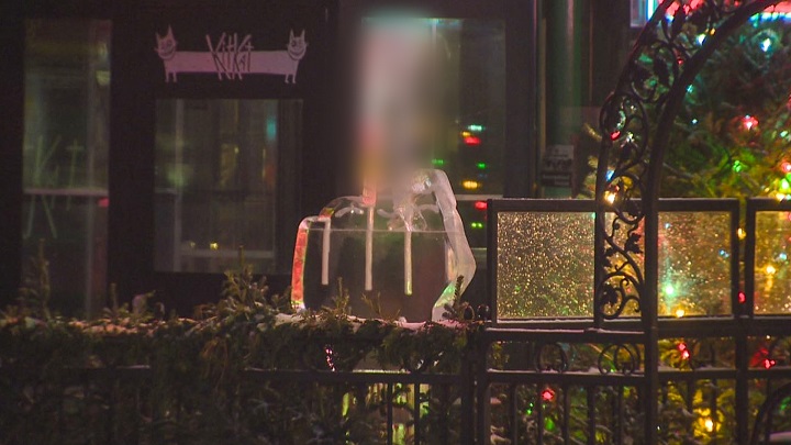 A large ice sculpture showing a hand with a raised middle finger was placed in front of the Kit Kat Italian Bar and Grill Friday evening in protest of the King Street transit pilot project.