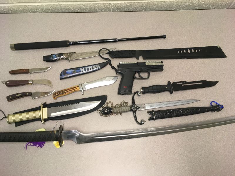 Lethbridge police seized a sawed off shotgun, ammunition, knives, swords, throwing knives, a baton and two airsoft handguns during an investigating into allegations of drug trafficking in the downtown core.