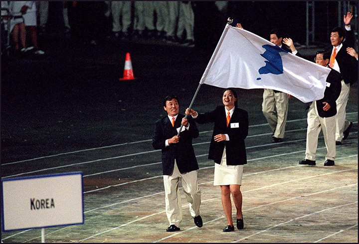 South and North Korean delegations parade together for the first time during the opening ceremony of the Sydney Olympics on Sept. 15, 2000.