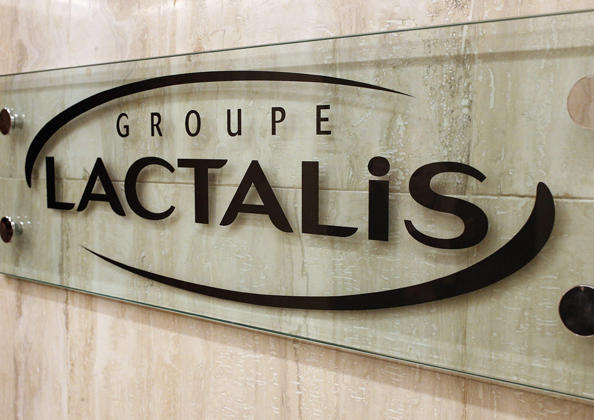 The logo of Groupe Lactalis is seen as Head of Communication & External Relations, Michel Nalet attends a press conference in Paris, Thursday, Jan. 11, 2018. 