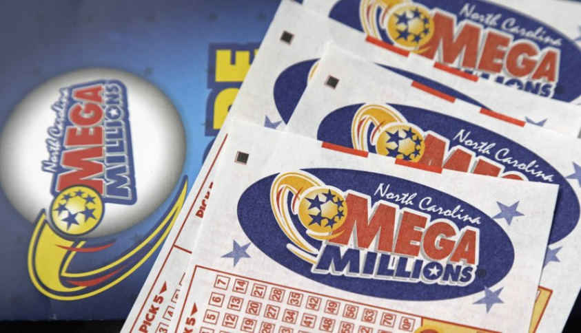 None
FILE - In this July 1, 2016, file photo, Mega Millions lottery tickets rest on a counter at a Pilot travel center near Burlington, N.C. The jackpot for the Mega Millions lottery game has climbed to over $450 million, just hours before the drawing, Friday, Jan. 5, 2018. 