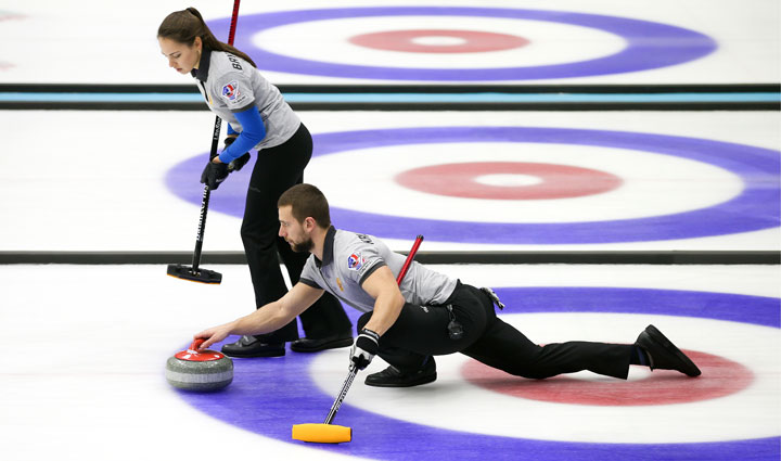Anastasia Bryzgalova and Alexander Krushelnitsky of the Russia 1 Team compete against Magnus Nedregotten and Kristin Moen Skaslien of Team Norway in the final of the Sochi International Mixed Doubles event of the 2017/18 World Curling Tour (WCT) at the Ice Cube curling centre.