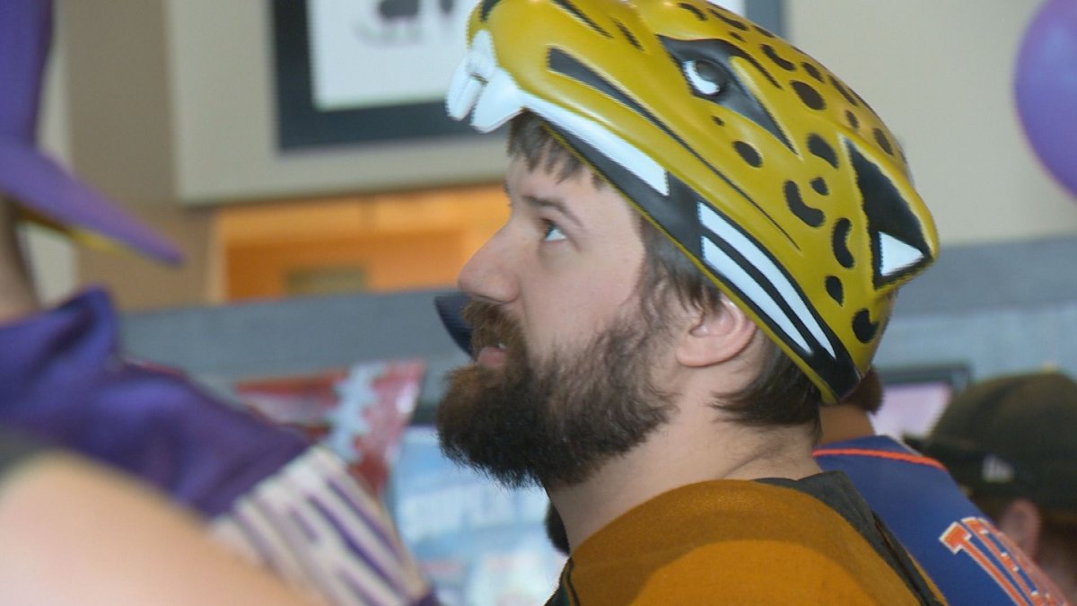 A Jacksonville Jaguars fan looks on for the NFL's AFC Championship at the Canadian Brewhouse in Regina. 