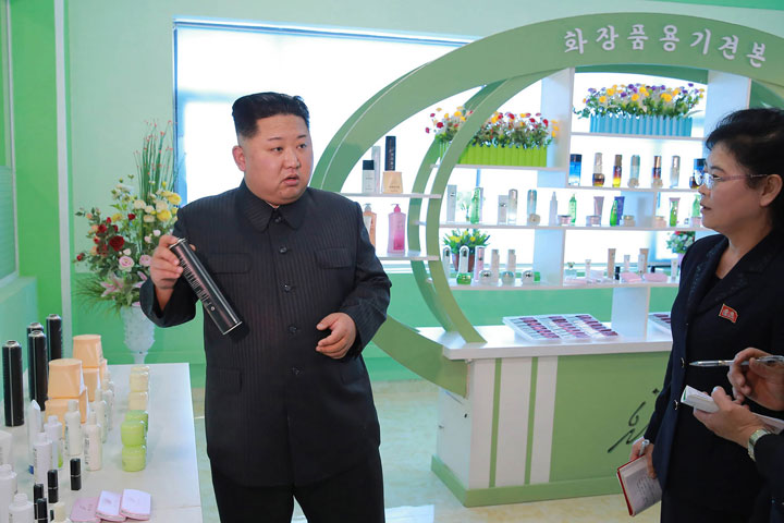 This undated picture released from North Korea’s official Korean Central News Agency (KCNA) on Oct. 29, 2017, shows North Korean leader Kim Jong Un (C) inspecting the Pyongyang Cosmetics Factory.