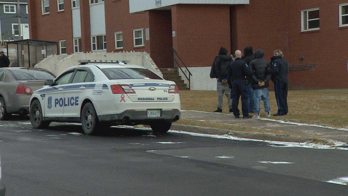 Halifax Regional Police say five people are facing numerous firearms charges after officers executed two search warrants in Dartmouth on Monday. 