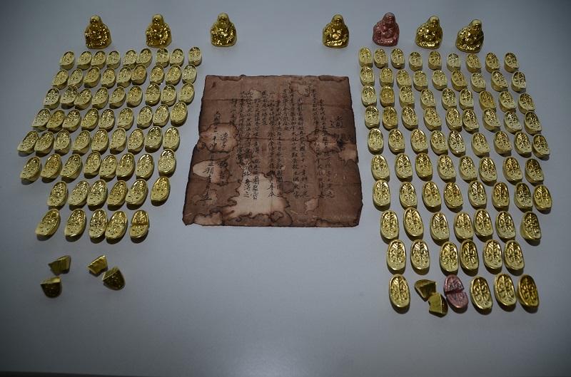 Richmond RCMP say two men have been charged for allegedly selling fake gold artifacts (pictured).