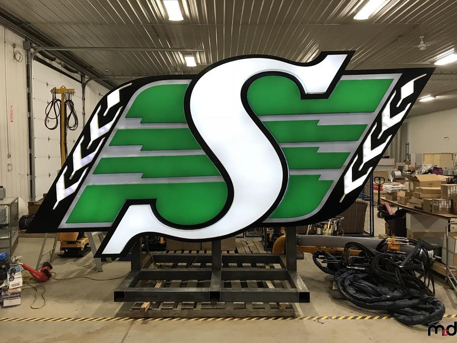 The giant Saskatchewan Roughriders sign was removed from the old Mosaic Stadium in Regina when the team's former home was torn down.