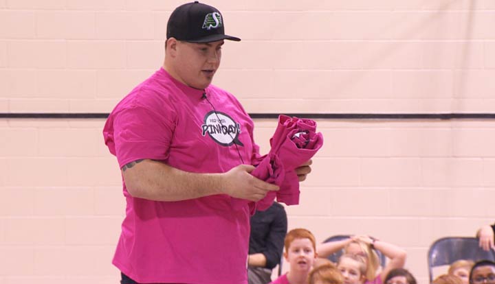 Saskatchewan Roughriders, like Dan Clark, helped kick off the annual Red Cross Pink Day campaign with a T-shirt reveal.