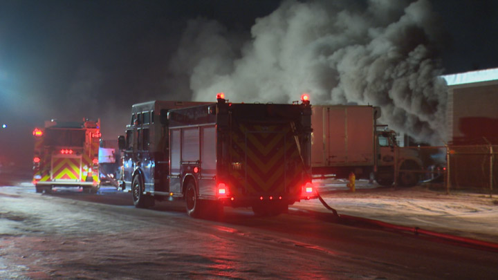 A fire at a Saskatoon business started in a semi and spread to the ceiling of the building.