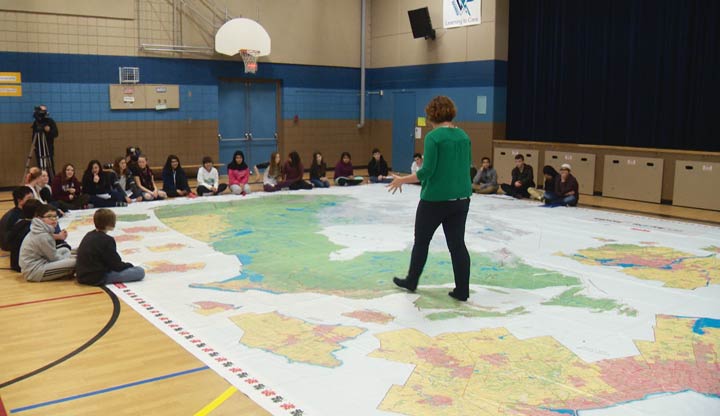 Saskatoon students got to walk across Canada without leaving their gymnasium on Monday.