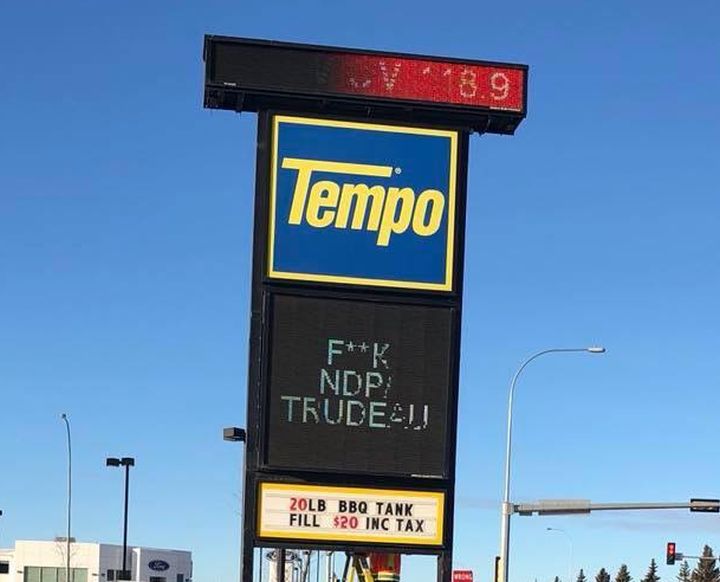 A sign outside a Spruce Grove gas station targets the carbon tax Tuesday, Jan. 2, 2018.