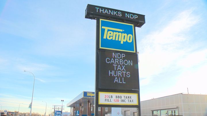 A sign outside a Spruce Grove gas station targets the carbon tax Tuesday, Jan. 2, 2018.