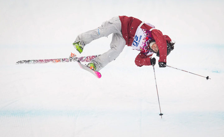Yuki Tsubota takes a hard fall during the women's freestyle finals at the Rosa Khutor Extreme Park during the Sochi Winter Olympics February 11, 2014. 