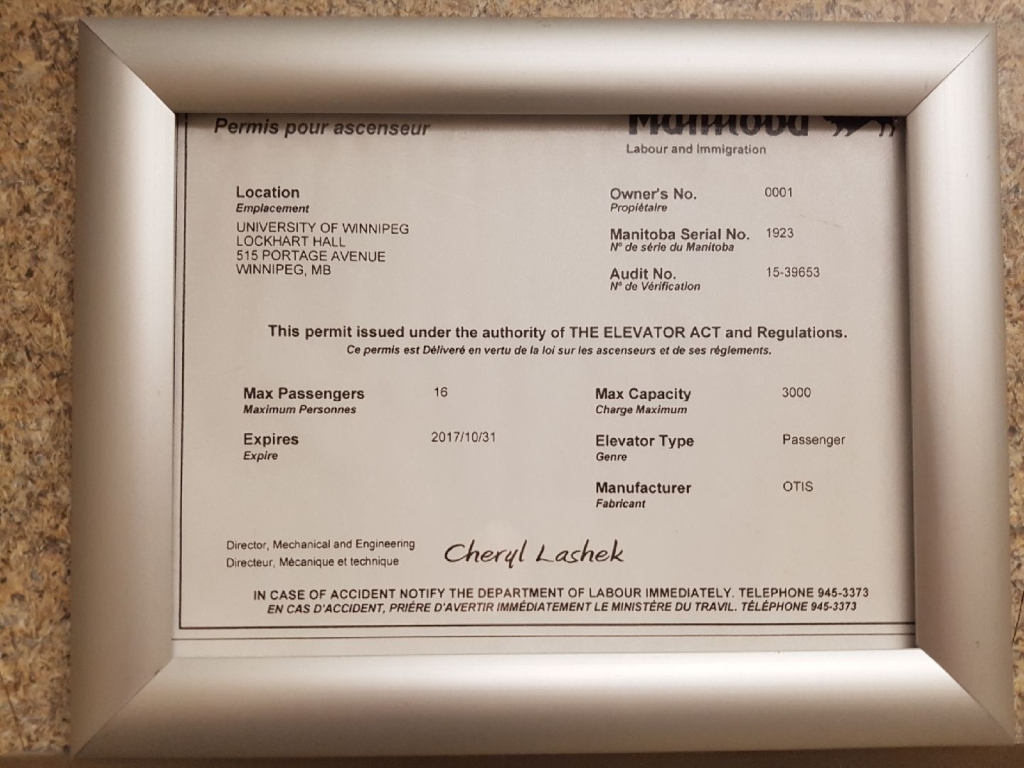An elevator permit at the University of Winnipeg.