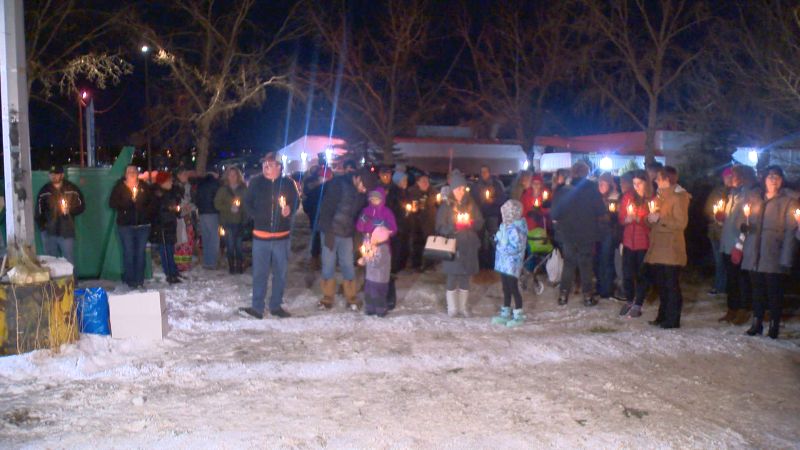 Dozens attend candlelight vigil for baby found dead in Calgary parking ...