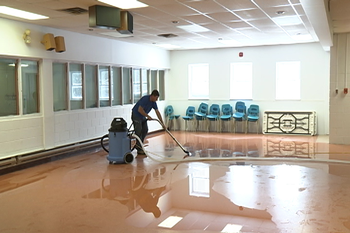 Cleanup continues at the Warsaw Arena after a frozen pipe burst.