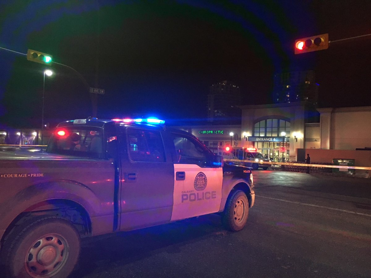 The Calgary Police Service investigates after a body was found in the parking lot of Westbrook Mall on Tuesday, Jan. 16, 2018. 
