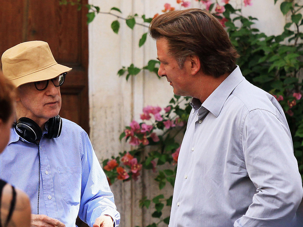 Woody Allen and Alec Baldwin speak during the filming of 'To Rome With Love,' at Piazza Madonna Dei Monti on July 26, 2011 in Rome, Italy.