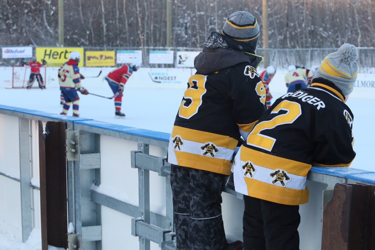 Children watching the World's Longest Hockey Game at Saiker's Acres near Edmonton, Alta.  February 9, 2018.