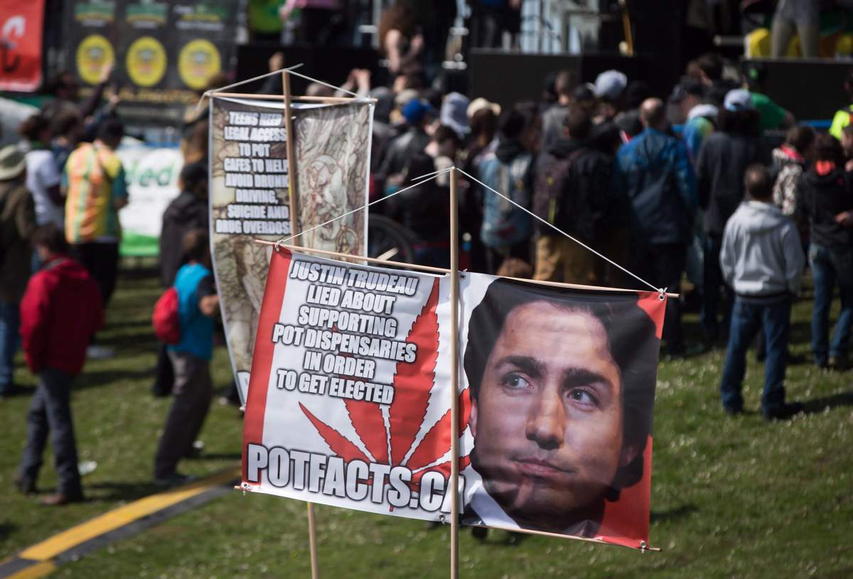 A banner with a photo of Prime Minister Justin Trudeau is displayed at the annual 4-20 cannabis culture celebration at Sunset Beach in Vancouver, B.C., on Thursday, April 20, 2017. THE CANADIAN PRESS/Darryl Dyck
