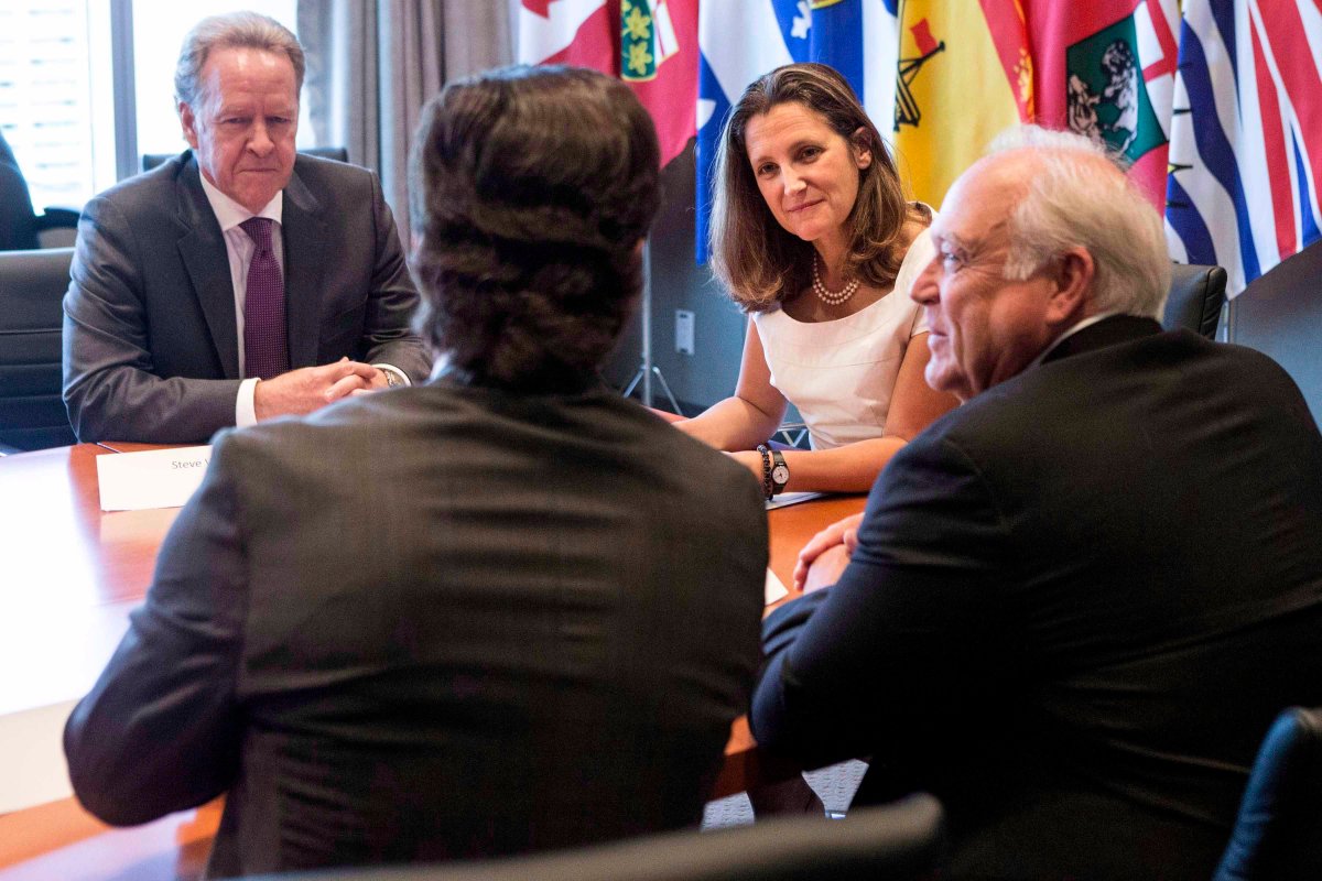 Canada's Chief NAFA negotiator Steve Verheul, left to right, Foreign Affairs Minister Chrystia Freeland, Unifor President Jerry Dias and United Auto Workers President Dennis Williams meet in Toronto on Friday, August 25, 2017, ahead of discussions over the preparation for the sixth round of North American Free Trade Agreement renegotiations. 