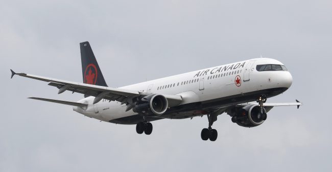 An Air Canada flight lands at Toronto Pearson International Airport in Toronto, Oct. 15, 2017. 