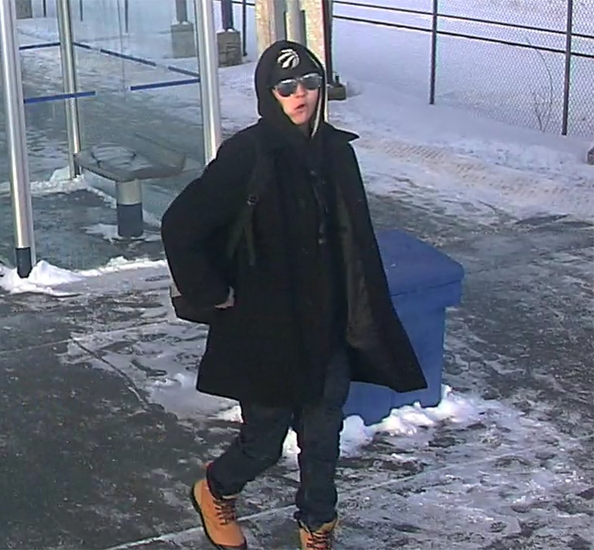 Calgary police have released photos of a man they allege stole a woman's cellphone and demanded money for it.