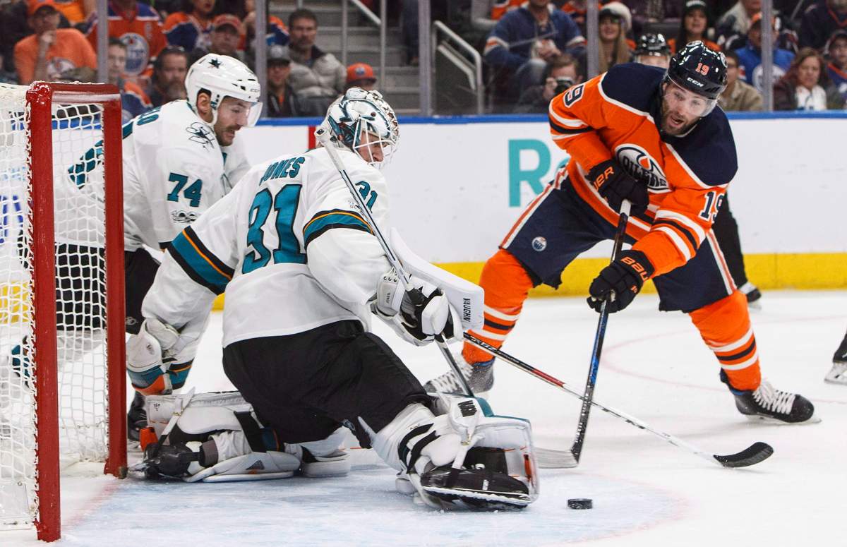 San Jose Sharks goalie Martin Jones (31) makes the save on Edmonton Oilers' Patrick Maroon (19) during second period NHL action in Edmonton, Alta., on Monday December 18, 2017. THE CANADIAN PRESS/Jason Franson.