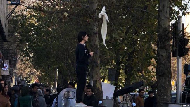 A new spate of Iranian anti-hijab protests picked up steam after this image of protester Vida Movahed, taken Dec. 27, 2017, went viral.