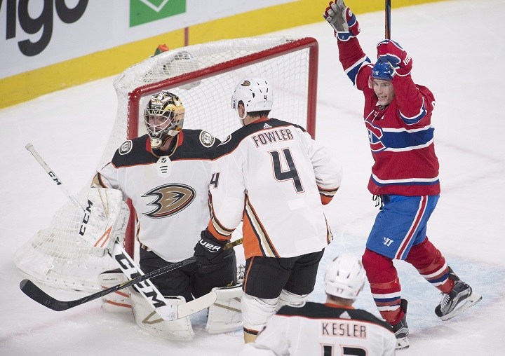 Montreal Canadiens right wing Brendan Gallagher (11) celebrates a goal by teammate defenceman Jeff Petry (not shown) as Anaheim Ducks goaltender Reto Berra (1) and defenceman Cam Fowler (4) react during third period NHL hockey action in Montreal, Saturday, February 3, 2018. 