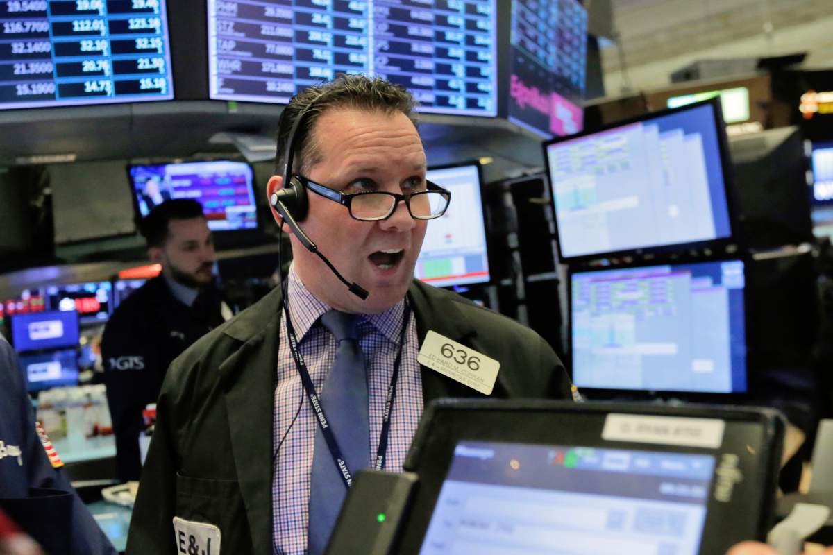 Trader Edward Curran works on the floor of the New York Stock Exchange, Tuesday, Feb. 6, 2018.